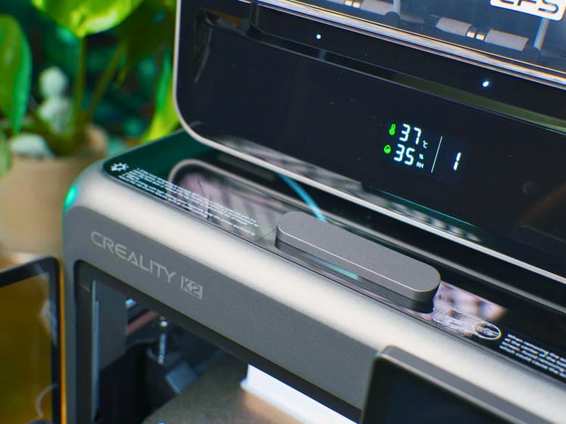 Close-up of the Creality K2 3D printer in a review video